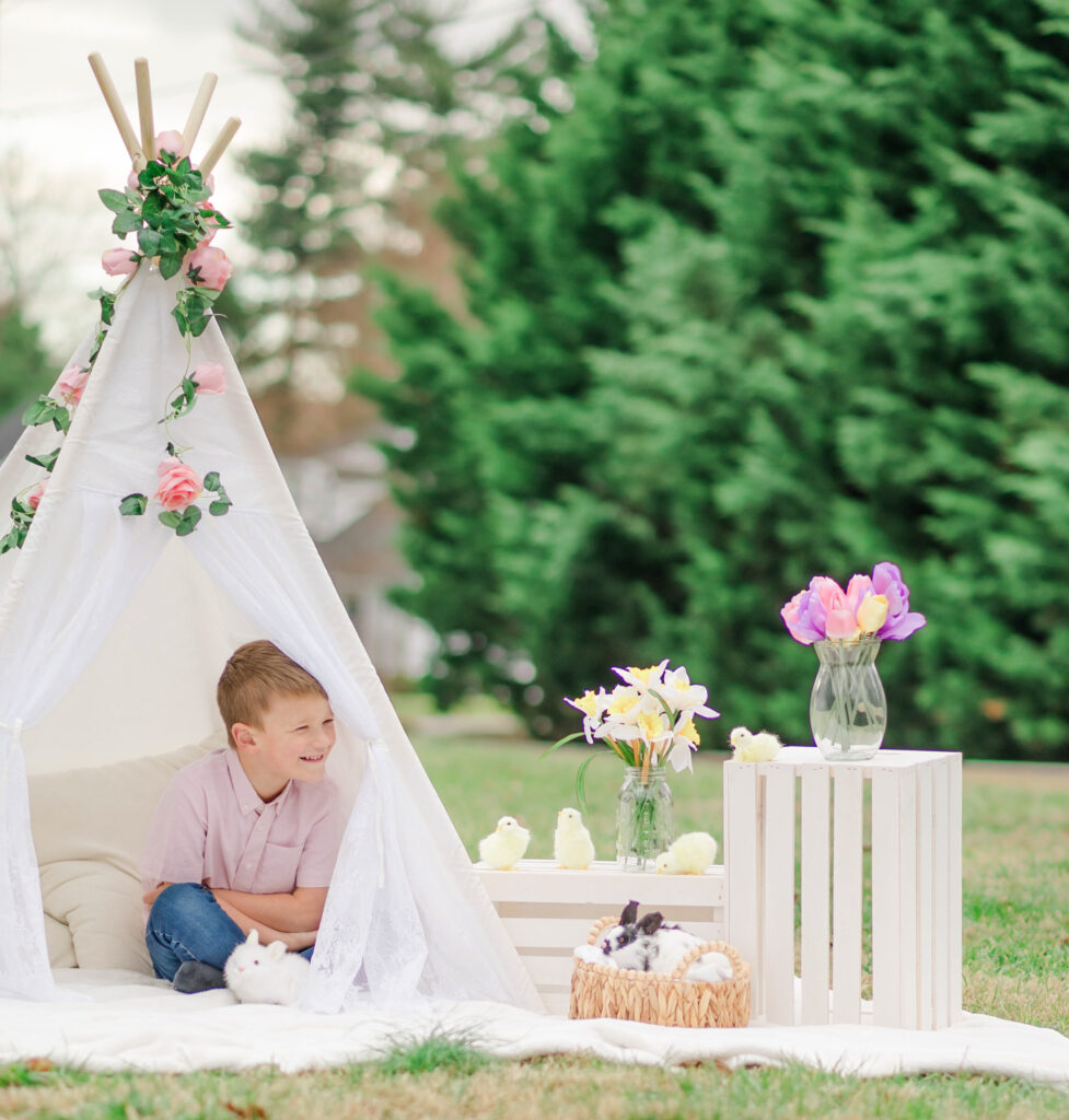 Boy laughing during spring family photos in Wilmington Delaware