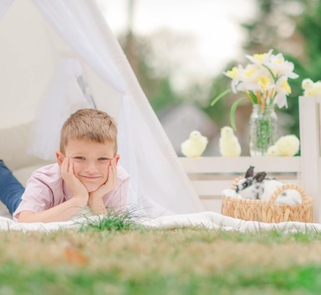 Boy posing for spring family photos in Wilmington Delaware