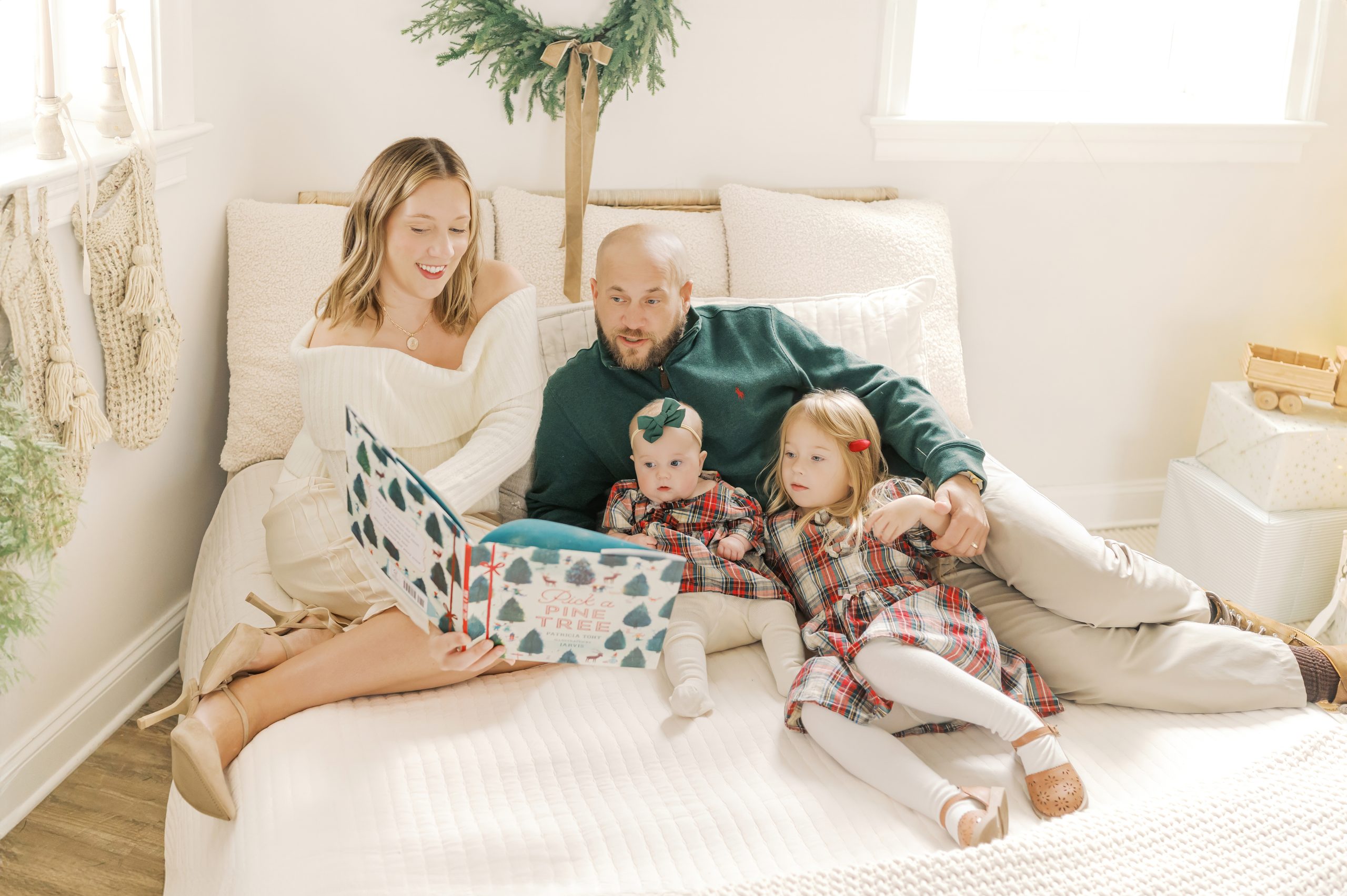 Family wears beautifully coordinated outfits in holiday photos taken by Delaware Family Photographer